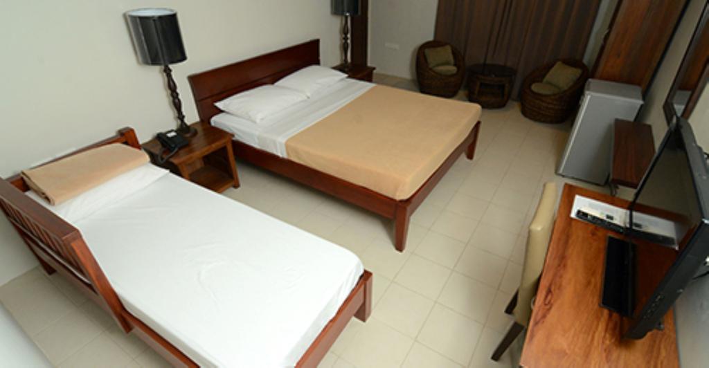 Isabel Suites Лаоаг Номер фото