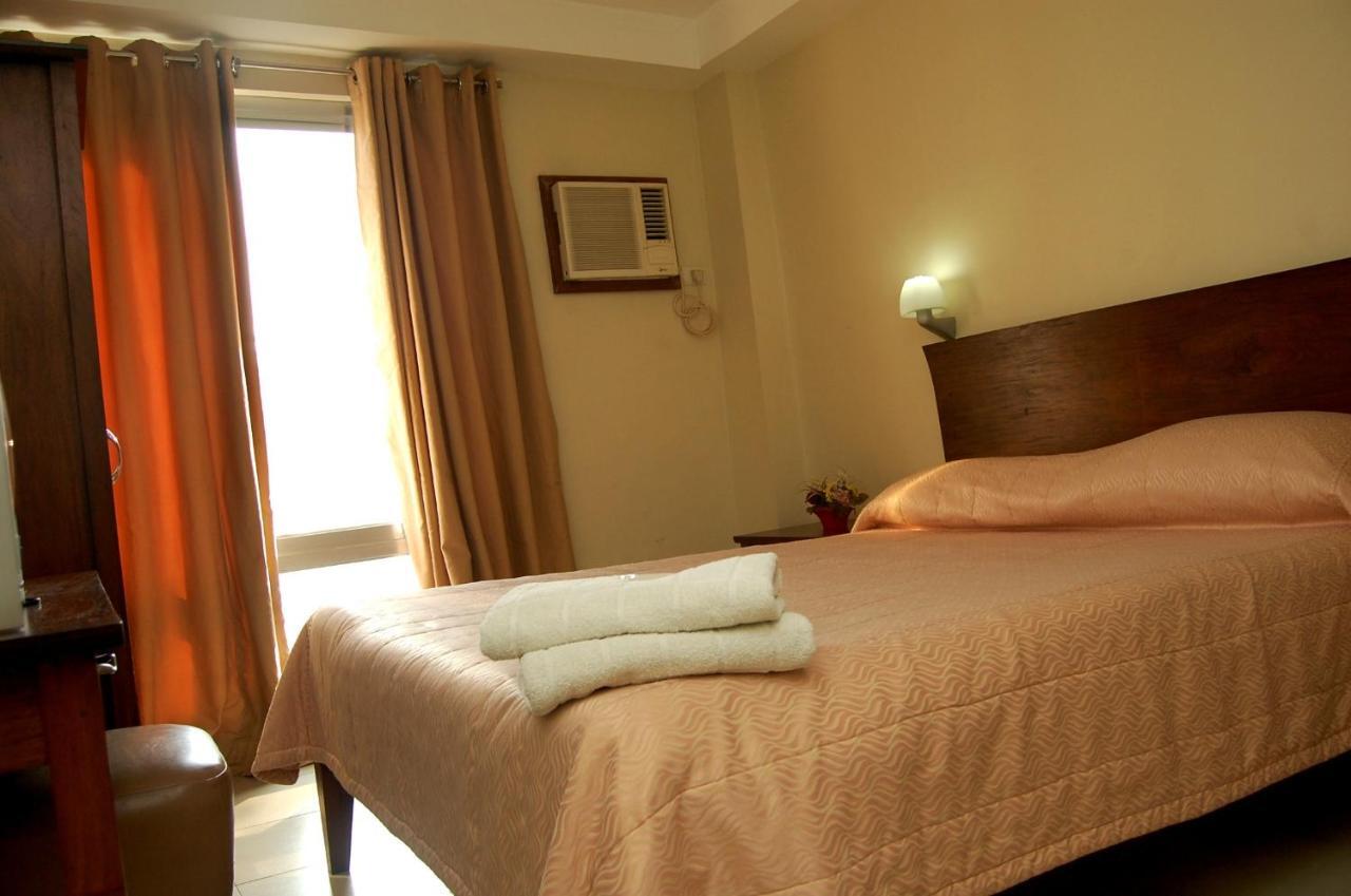 Isabel Suites Лаоаг Номер фото